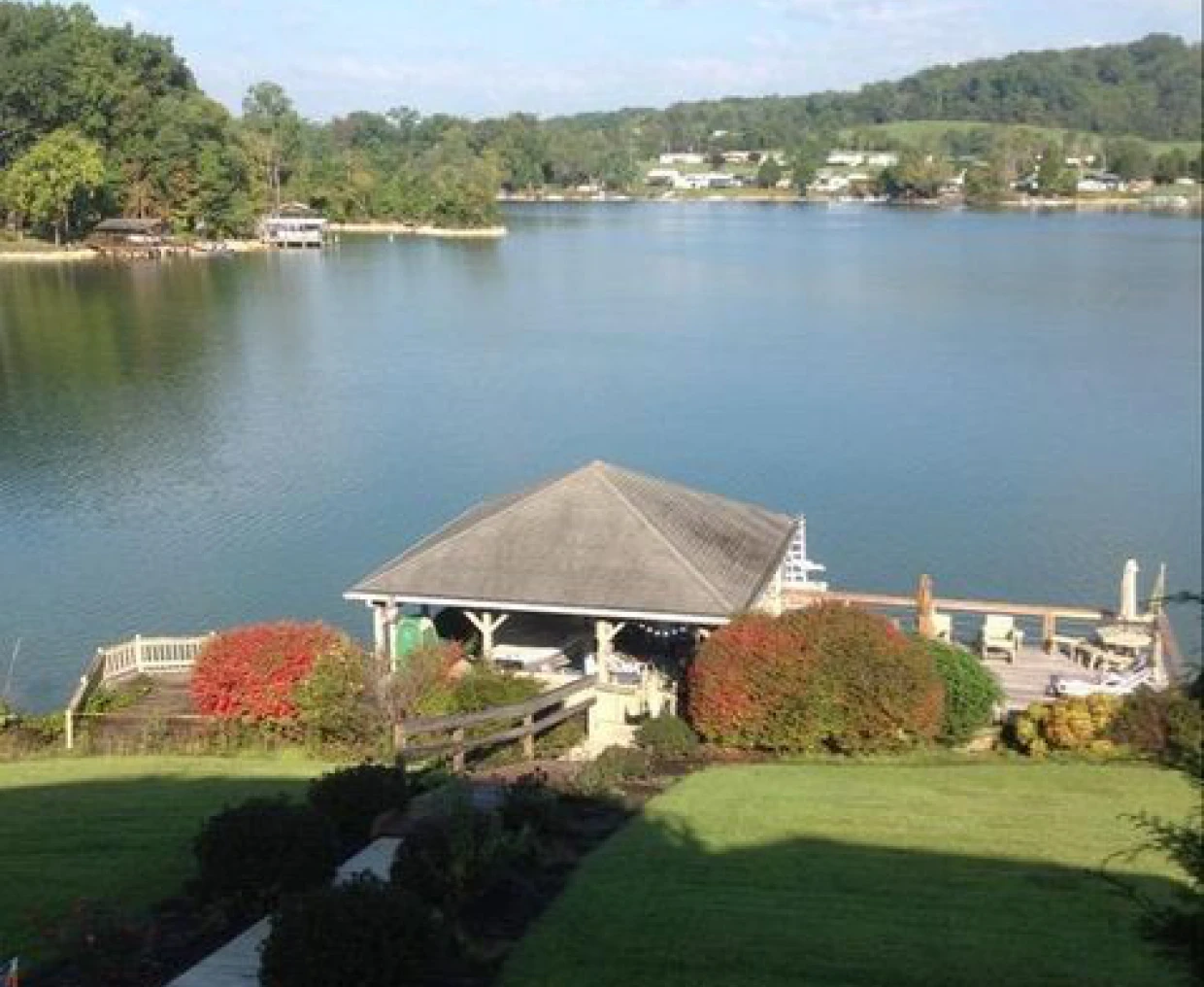 Waterfront gazebo amidst greenery